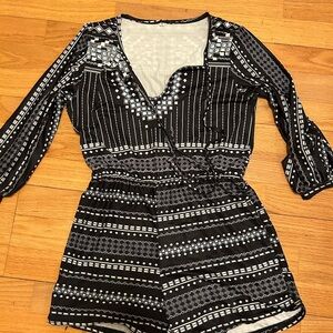 Pre-Owned Romper. 
Size Small